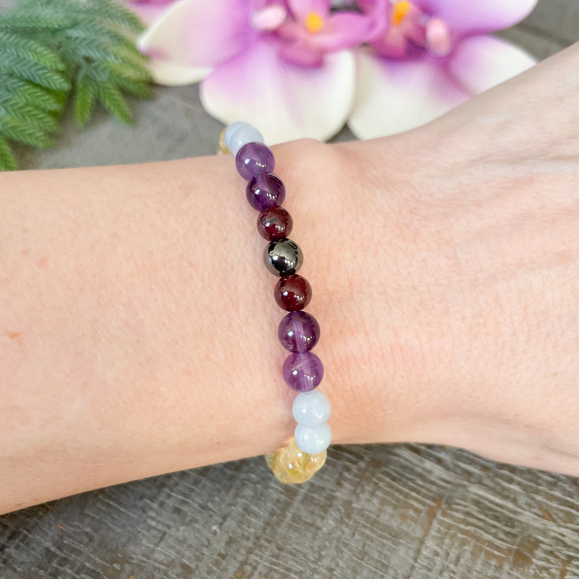 Pain Relief Bracelet being worn on a woman's wrist