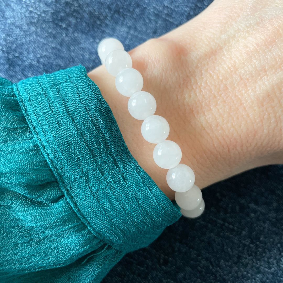 White Jade Bracelet 8mm on woman's wrist